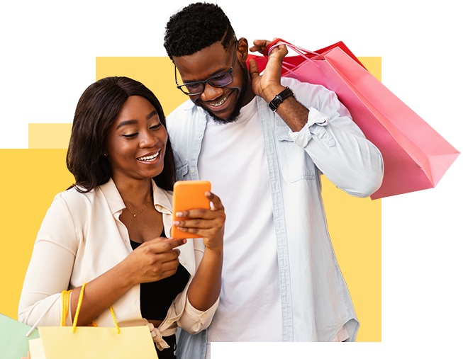 couple shopping and looking at cell phone